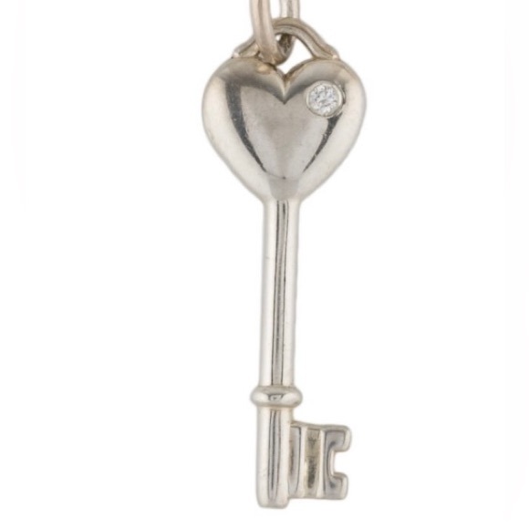 Authentic Tiffany& Co. heart key pendant necklace. 925 Silver & Diamond. Love